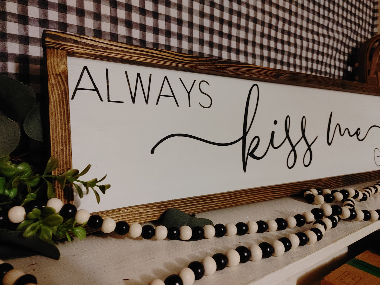 Always Kiss Me Goodnight - above the bed sign