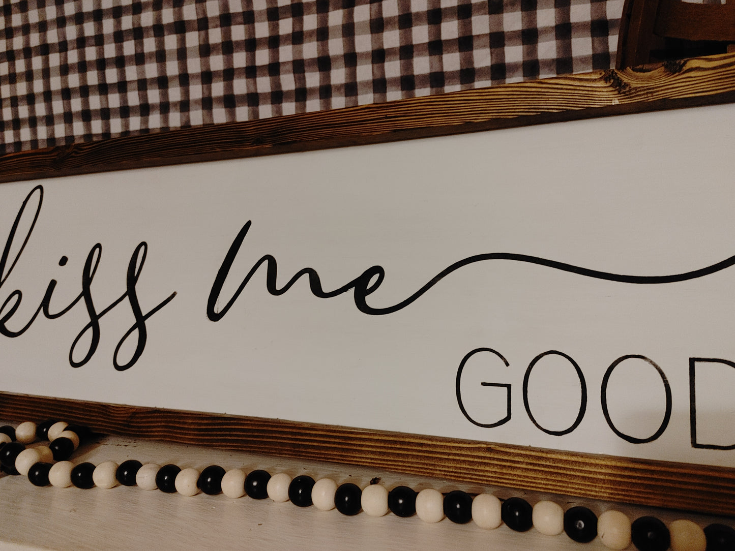 Always Kiss Me Goodnight - above the bed sign
