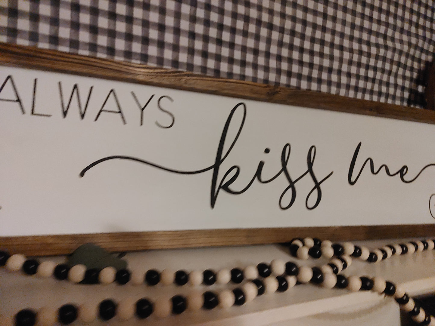 Always Kiss Me Goodnight - above the bed sign