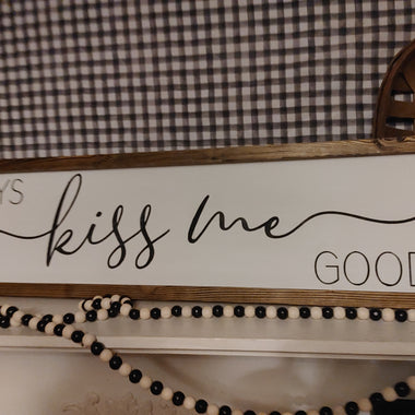 Always Kiss Me Goodnight - above the bed sign