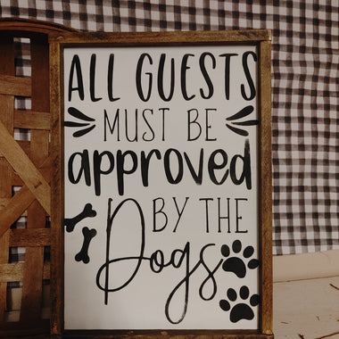 All guests must be approved by the dogs Sign